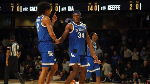 Jan 24, 2023; Nashville, Tennessee, USA; Kentucky Wildcats forward Jacob Toppin (0) and forward Oscar Tshiebwe (34) celebrate after a win against the Vanderbilt Commodores at Memorial Gymnasium